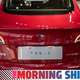 The back of a Tesla car Model 3 is seen at a Tesla shop inside of a shopping Mall in Beijing on May 26, 2021. (Photo by NICOLAS ASFOURI / AFP)